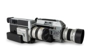 CANON: Two c. 1970s 8mm movie cameras - one Canon Auto Zoom 814 with 7.5-60mm f1.4 zoom lens [#242222] and Canon 60mm T-60-2 lens hood, and one Canon Auto Zoom 814 Electronic [#157345] with 7.5-60mm f1.4 macro lens [#161467], lens cap, and wrist strap. (2