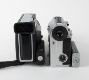 CANON: Two c. 1970s 8mm movie cameras - one Canon Auto Zoom 814 with 7.5-60mm f1.4 zoom lens [#242222] and Canon 60mm T-60-2 lens hood, and one Canon Auto Zoom 814 Electronic [#157345] with 7.5-60mm f1.4 macro lens [#161467], lens cap, and wrist strap. (2 - 4