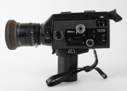 NIPPON KOGAKU: Circa 1973 Nikon R10 Super 8mm movie camera [#792850] with Cine-Nikkor Zoom&middot;C Macro 7-70mm f1.4 lens, UV lens filter, rubber lens hood, rubber eyepiece, and wrist strap. - 3