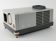 LEITZ: Pradovit N24 slide projector, c. 1974, with Colorplan 90mm f2.5 lens, lens cap, instruction booklet, and warranty card. - 2