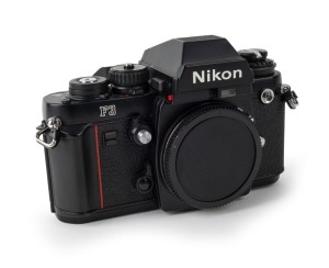 NIPPON KOGAKU: Black c. 1980 Nikon F3 body [#1667501], with body cap.