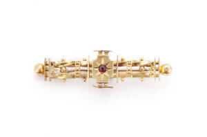 BROOCH: 9ct yellow gold Australian bar brooch. 4.25 grams.