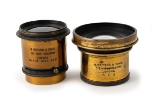 W. WATSON & SONS: Two c. 1880s brass lenses approx. 36mm in diameter both with 'W. Watson & Sons 313 High Holborn London' engraving - one 56mm in height and marked 6¼ x 4¾ W.A.L. 4361, and one 47mm in height and marked 10 x 8. (2 items)