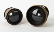W. WATSON & SONS: Two c. 1880s brass lenses approx. 36mm in diameter both&nbsp;with 'W. Watson & Sons 313 High Holborn London' engraving - one 56mm in height and marked 6&frac14; x 4&frac34; W.A.L. 4361,&nbsp;and one 47mm in height and marked 10 x 8. (2 items) - 2