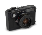 LEITZ: Leica CL rangefinder camera [#1311705], c. 1973, with Summicron-C 40mm f2 lens [#2591496]&nbsp;and rubber lens hood.