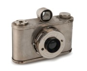 TAHBES: Synchro&nbsp;medium-format camera, c. 1948, with polished metal body,&nbsp;meniscus lens, and unusual Albada finder.