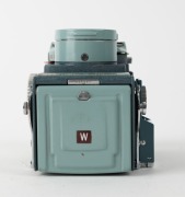 MINOLTA: 1959 Miniflex TLR camera [#105187], with Rokkor&nbsp;60mm f3.5 lens [#1103379], sportsfinder&nbsp;attachment, and lens cap. One of fewer than 5000 produced. - 5