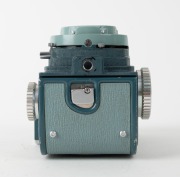 MINOLTA: 1959 Miniflex TLR camera [#105187], with Rokkor&nbsp;60mm f3.5 lens [#1103379], sportsfinder&nbsp;attachment, and lens cap. One of fewer than 5000 produced. - 6