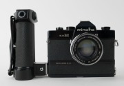 MINOLTA: Black-body Minolta SR-M SLR camera [#1002391], c. 1970, with MC Rokkor-PF&nbsp;55mm f1.7 lens [#2478516] and hand grip attachment. The first 35mm SLR with integrated motor built into the body. - 2