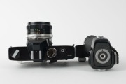 MINOLTA: Black-body Minolta SR-M SLR camera [#1002391], c. 1970, with MC Rokkor-PF&nbsp;55mm f1.7 lens [#2478516] and hand grip attachment. The first 35mm SLR with integrated motor built into the body. - 4