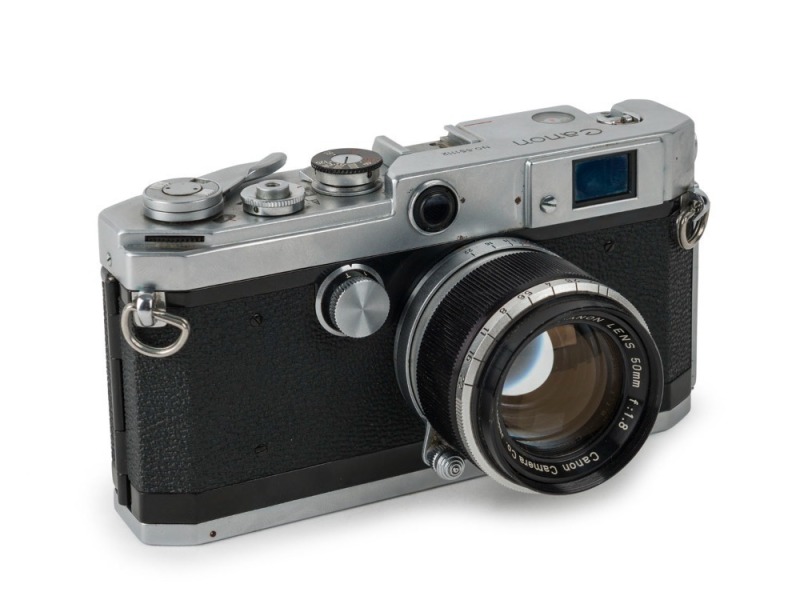 CANON: L1 rangefinder camera [#551112] in chrome, c. 1956, with Canon 50mm f1.8 lens [#218368]. One of only approximately 8000 units to be produced.