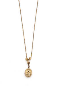 ALBERTINA: Antique gold Albertina and rolled gold locket. 25.92 grams.