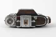 ZEISS IKON: Rare brown-leather Super Ikonta&nbsp;A 531 vertical-folding rangefinder&nbsp;camera [#C12457], c. 1954, with Tessar&nbsp;75mm f3.5 lens [#995502] and&nbsp;Synchro-Compur&nbsp;shutter. - 4