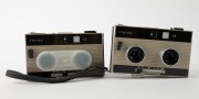 MEOPTA: Two Stereo 35 viewfinder cameras [#2-4547 & #2-5125] with twin Mirar 25mm f3.5 lenses, c. 1971, one in green with double lens cap, and one in black with wrist strap. (2 cameras) - 2