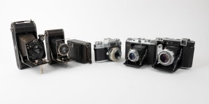 ZEISS IKON: An accumulation of six cameras - one c. 1927 Maximar 207/3 [#O88717], one c. 1929 Cocarette 519/6 [#N98601], one c. 1930s Cocarette, one c. 1937 Super Ikonta B 532/16 [#X23852], one c. 1951 Ikonta M 524/16 [#U78537], and one c. 1959 Contaflex 