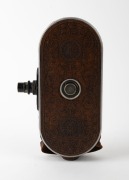 BELL & HOWELL: Filmo 75 16mm film camera [#48549], c. 1928, with beautifully ornate patterned brown leather covering. - 3