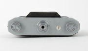 OLYMPUS: Chrome Six II vertical-folding camera [#34865], c. 1948, with Zuiko Coated 75mm f2.8 lens [#59760] and Copal lens. Presented with leather case in maker's wooden box that features etched text&nbsp;on lid. - 5