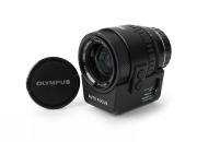 OLYMPUS: Black OM-System Zuiko Auto-Zoom 35-70mm f4 lens [#105032], c. 1982, with front and rear caps.