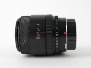 OLYMPUS: Black OM-System Zuiko Auto-Zoom 35-70mm f4 lens [#105032], c. 1982, with front and rear caps. - 4