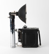 GRAFLEX: Speed Graphic plate camera, c. 1930, with Ektar 101mm f4.5 lens [#E01586], Kalart Synchronized Range Finder attachment [#A42562], and Heiland Research Corporation flash unit attachment. - 2
