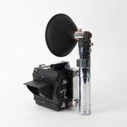 GRAFLEX: Speed Graphic plate camera, c. 1930, with Ektar 101mm f4.5 lens [#E01586], Kalart Synchronized Range Finder attachment [#A42562], and Heiland Research Corporation flash unit attachment. - 4