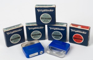 VOIGTLÄNDER: Seven 40.5mm lens filters in plastic maker's cases, five also with maker's boxes - two 343/41 Focar A filters, one 344/41 Focar B, one 345/41 Focar C, one 347/41 Bessamatic Portrait Lens, one 348/41 Bessamatic Focar B, and one 325/41 SF. (7 i