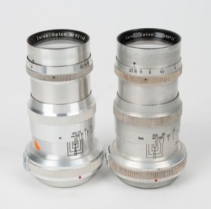 CARL ZEISS: Two Contax-mount Zeiss-Opton Sonnar T 135mm f4 lenses [#890714], c. 1951, one with scale in meters and one with scale in feet, together with metal rear lens caps.