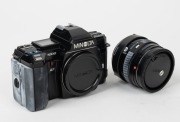 MINOLTA: Circa 1985 Minolta 7000 AF Anniversary Kit, comprising black camera body with body cap, black Minolta AF Zoom 35-70mm f4 lens with lens hood and front and rear caps, lens cleaning set, and black Minolta 60th Anniversary carry strap, neatly organi - 2