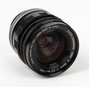 CANON: Black Super-Canomatic R 35mm f2.5 lens [#11990], c. 1961, with bayonet mount for Canonflex SLR cameras, together with rear lens cap.