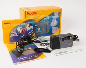 KODAK: Circa 1996 Kodak DC25 Digital Camera in maker's box with various cables and printed matter.