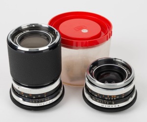 CARL ZEISS: Two c. 1970s lenses in black and chrome with M42 mounts - one Skoparex 35mm f3.4 [#7023312] in plastic display dome, and one Super-Dynarex 135mm f4 [#7192387]. (2 lenses)