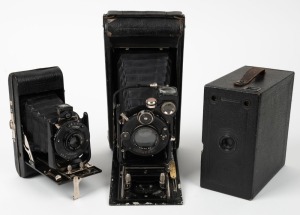 HOUGHTON: Three c. 1930s cameras - one Ensign Carbine vertical-folding camera with Xpres 6" f4.9 lens and shutter release cable, one No. 4 Watch Pocket Carbine vertical-folding camera with Aldis Uno Anastigmat 4.75" f7.7 lens, and one Ensign Junior Model 