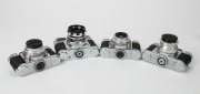 BRAUN: Four black and chrome c. 1950s 35mm cameras - one Paxette Super III, one Super Paxette with front lens cap, one Paxette, and one Paxette with front lens cap. (4 cameras) - 5