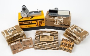 NIPPON KOGAKU: Ten c. late 1950s accessories all in maker's boxes, many with instruction booklets - one Model 3 Exposure Meter for Nikon F, one +1.0 Eyepiece Correction Lens for F3, one -3.0 Eyepiece Correction Lens for F3, one Nikon F HN-9 20/f3.5 screw-in type lens hood, one Nikkorex F Exposure Meter, four Nikon F focusing screens of types A, C, F and G1, and one LF-1 rear lens cap. (10 items)