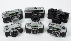 KURIBAYASHI: Six 35mm film cameras - one c. 1957 Petri 2.8 Color Corrected Super with metal lens cap, one c. 1976 Petri 7sII, one c. 1960 Petri Half, one 1960 Petri Compact E, one c. 1968 Petri Color 35 [#518906], and one 1980 black-body Petri MF-3 SLR [#