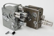 NIZO: Two 8mm movie cameras - one c. 1959 Heliomatic 8 Trifo [#108359] in maker's leather case with four lens caps, two lens filters, and one lens extension tube element, together with one c. 1960 Heliomatic 8 [#411878] with two lens caps, one lens filter - 2