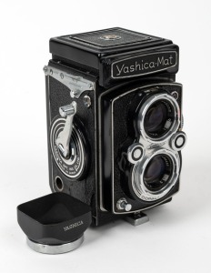 YASHICA: Circa 1957 Yashica-Mat TLR camera, with Lumaxar 80mm f3.5 lens and Yashica black metal lens hood.