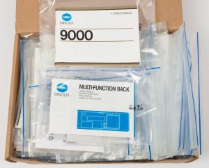 MINOLTA: One A4 archive box containing sixty Minolta product brochures, sales guides, and instruction manuals, each sealed in a plastic sleeve. (60 items)