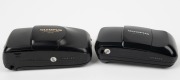 OLYMPUS: Two black c. 1995 compact cameras - one gold-letter Olympus Mju Zoom Deluxe [#1345192] with Multi AF Zoom 35-70mm lens, and one grey-letter Olympus Mju-1 [#7718532] with Multi AF 35mm f3.5 lens. (2 cameras) - 2