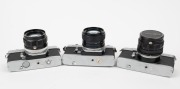 MINOLTA: Three SLR cameras - one c. 1964 SR-1s [#4070278] with Auto Rokkor-PF 58mm f1.4 lens [#1255296] and front lens cap, one c. 1966 SRT-101 [#1317063] with MC Rokkor-PF 58mm f1.4 lens [#5136214], and one c. 1975 XE-1 [#1088067] with MC Rokkor-PG 50mm - 3
