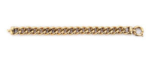 BRACELET: 9ct yellow gold curb link bracelet. 33 grams.