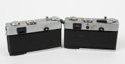 OLYMPUS: Two early 1970s rangefinder cameras - one Olympus-35 SP [#120246] with G. Zuiko 42mm f1.7 lens, and one Olympus-35 SPn [#392445], also with G. Zuiko 42mm f1.7 lens. (2 cameras) - 2