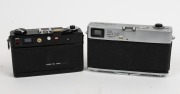 CANON: Two rangefinder cameras - one rare c. 1965 black-body Canonet QL17 [#548390], and one c. 1961 Canonet [#1556357]. (2 cameras) - 2