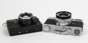 CANON: Two rangefinder cameras - one rare c. 1965 black-body Canonet QL17 [#548390], and one c. 1961 Canonet [#1556357]. (2 cameras) - 4