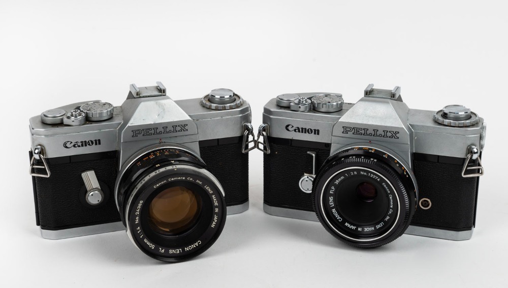 CANON: Two c. 1965 Pellix SLR cameras - one [#106389] with FLP 38mm f2.8  lens