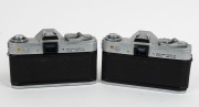 CANON: Two c. 1965 Pellix SLR cameras - one [#106389] with FLP 38mm f2.8 lens [#12274], and one [#126294] with FL 50mm f1.4 lens [#24366]. (2 cameras) - 3