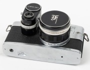 OLYMPUS: Pen F SLR camera [#159517], c. 1963, with F. Zuiko Auto-S 38mm f1.8 lens [#170815], ASA exposure meter attachment, and metal front lens cap. The world's first 35mm half-frame SLR. - 3