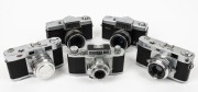 RIKEN: Five mid-20th century 35mm cameras - one Ricolet&nbsp;with C. Ricoh Anastigmat 45mm f3.5 lens [#33310], one Ricoh 500 with Ricomat 45mm f2.8 lens [#45774], one Ricoh 519 Deluxe with Rikenon 45mm f1.9 lens [#27719] and front lens cap, and two Ricoh 35 Fl
