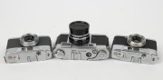 YASHICA: Three c. 1960 35mm cameras - one Yashica 35 [#38122080] with Yashinon 45mm f2.8 lens [#70807] and front lens cap, and two Yashica Mimy models [#ME4051540 & #ME3081166], one in black and one in grey,&nbsp;with Yashinon 28mm f2.8 lenses and differing bo - 2