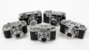 VARIOUS MANUFACTURERS: Five c. 1950s 35mm cameras in black and chrome&nbsp;- one Lacon R [#33807], one Kowa Kallo 35 [#52798], one Royal Camera Royal-35P [#66894], one Taisei Koki two-window Super Westomat 35,&nbsp;and one Novo 35 Super [#13848] with lens cap. (5 c